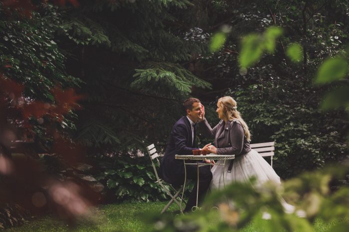 wedding gallery bride and groom having romantic moment in quiet garden